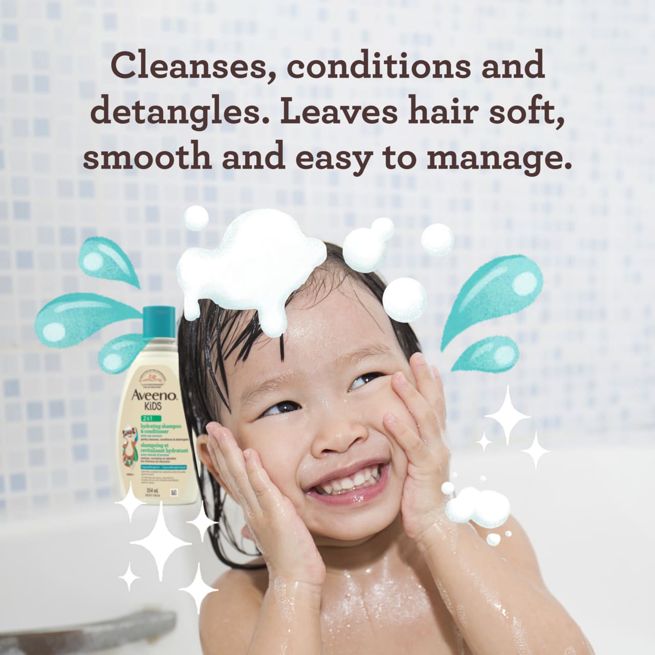 Smiling child in bath using the AVEENO® Kids Hydrating Shampoo & Conditioner